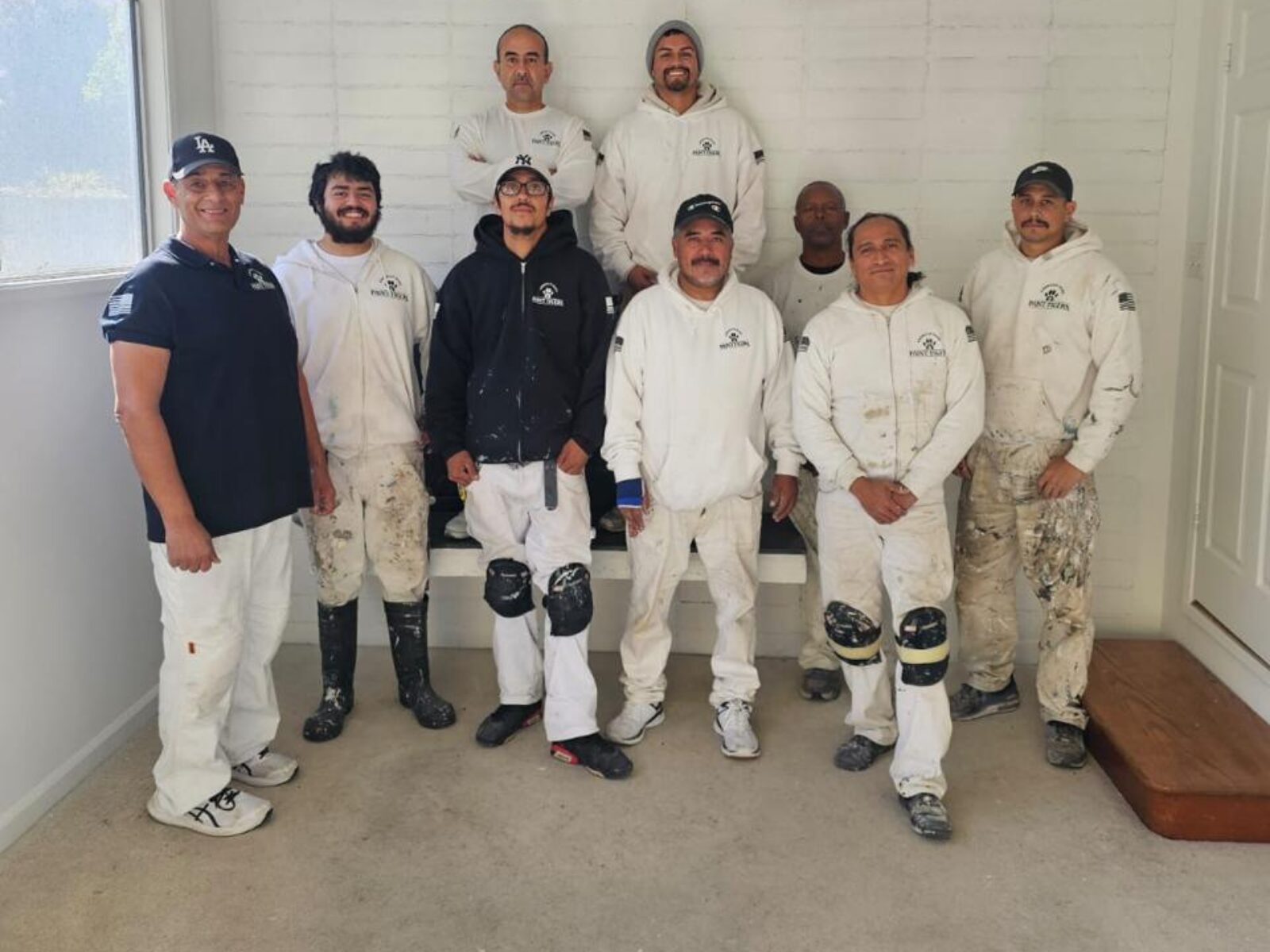 The Paint Tigers crew lined up before a job in Plano