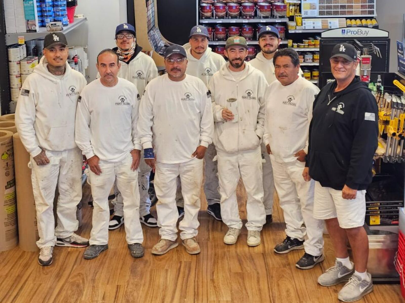 Paint Tigers crew picking up materials at the paint store