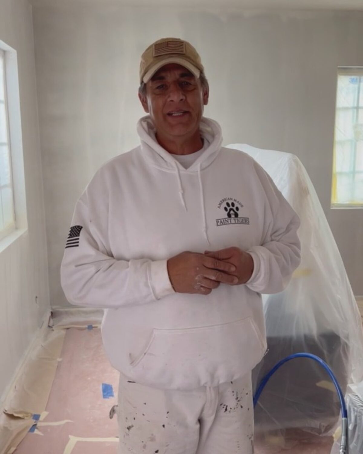 Ron, owner of Paint Tigers, on a job site in Plano